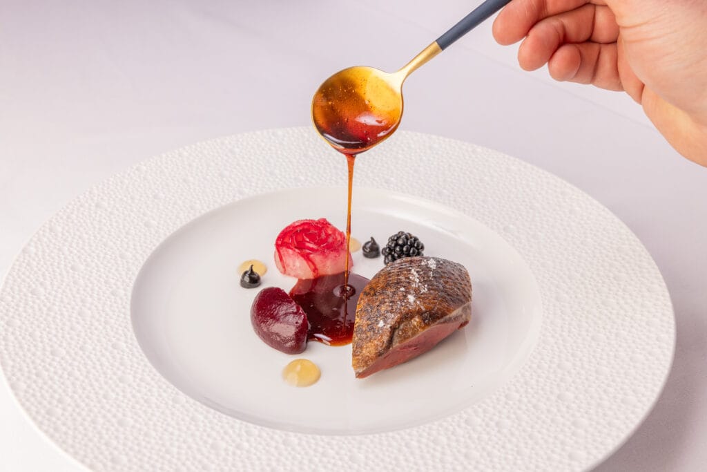 Modern Michelin-star cuisine at The Bishop’s Buttery in Cashel, with duck and amber sauce plated in contemporary style